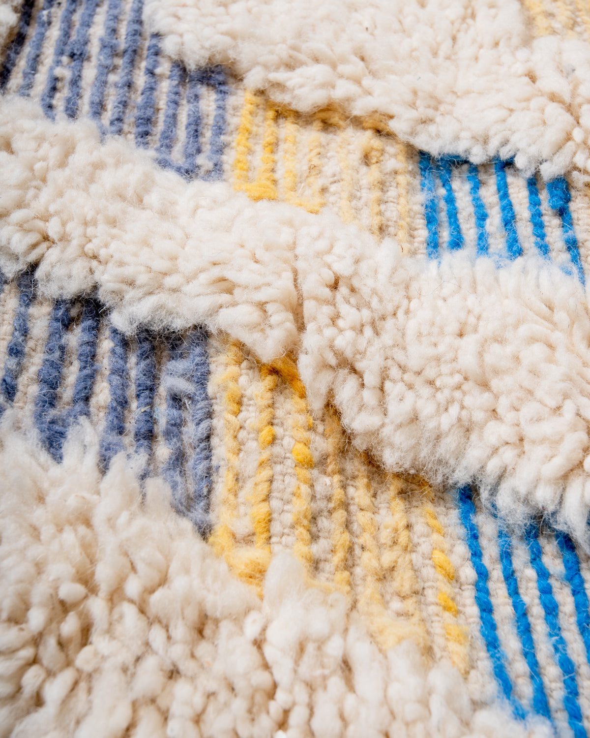 Modern, designer, handcrafted Berber rug from Morocco. Beniourain carpet with beautiful colours and patterns and fluffy wool texture.